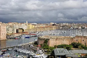 Yachts Prints: View of the marina and city from high ground in Old Port area of Marseille during the day