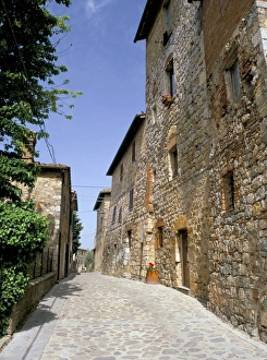 Monteriggioni Prints: View along Via Matteotti with the oldest building in