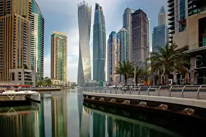Photogenic Prints: View of modern skyscrapers shining in sunrise light in Dubai Marina in Dubai