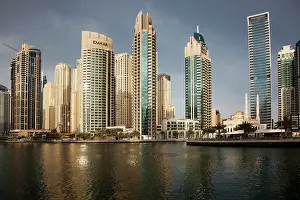 Radiant Prints: View of modern skyscrapers shining in sunrise light in Dubai Marina in Dubai