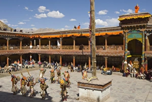 Ladakhi Culture Prints: View from above of monastery courtyard with monks in