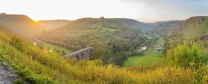 United Prints: View of Monsal Dale and a stone viaduct at sunset with autumn colors in Derbyshire Dales