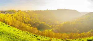United Prints: View of Monsal Dale and viaduct in autumn light over the hills near Bakewell in Derbyshire