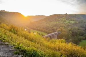 Country Prints: View of Monsal Dale and viaduct at sunset with autumn colors in Derbyshire, England