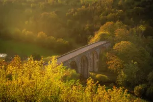 United Prints: View of Monsal Dale with a viaduct at sunset in autumn in the Derbyshire Dales region of England