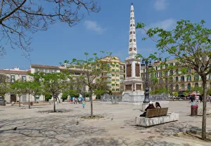 Typically Spanish Gallery: View of monument in Plaza de la Merced, Malaga, Costa del Sol, Andalusia, Spain, Europe
