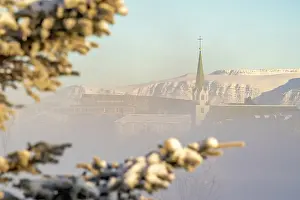 Wonderland Prints: View of morning mist in Tjornin park and Lutheran Free Church on a sunny day in winter
