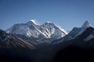 Snowy Peak Prints: A view of Mount Everest, distant peak to the left behind the Nuptse-Lhotse ridge