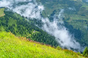 Range Prints: View of mountains and clouds from Schmittenhohebahn top station in Zell am See