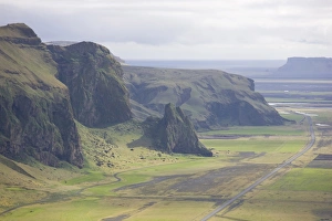 Icelandic Prints: View to mountains and Route 1, Icelands main highway, from hills above Vik i Myrdal
