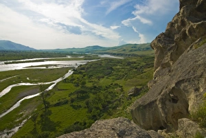 View over the Mtkvari River together with the Cave city of Uplistsikhe