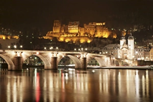 View over the Neckar River to Karl Theodor Bridge, Stadttor gate and castle in winter, Heidelberg, Baden Wurttemberg, Germany, Europe View over the Neckar River to Karl Theodor Bridge, Stadttor gate and castle in winter, Heidelberg, Baden Wurttemberg, Germany, Europe