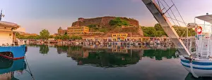 Waterfront Dining Prints: View of the New Fortress overlooking the Old Port Marina at sunset