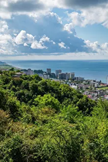 Recreational Prints: View of New Gagra with coastline and buildings under a cloudy sky in Russia