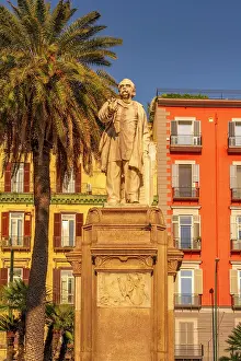 Sidewalk Prints: View of Nicola Amore statue and colourful architecture in Piazza della Vittoria