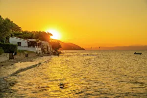 Thassos Town Prints: View of Nisteri Beach at sunset