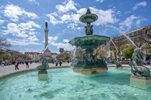 Time Prints: View of North fountain of Rossio in Praca do Rossio on a sunny day in Lisbon city centre