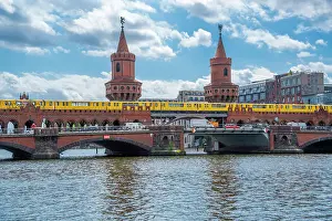River Spree Prints: View of Oberbaum Bridge near Eastside section of the former Berlin Wall along the Spree River
