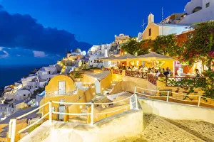 View of Oia village at dusk, Santorini, Aegean Island, Cyclades Island, Greek Islands