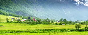 Pastoral Prints: View of Olden New Church in Olden village and mountains in Nordfjorden during summer