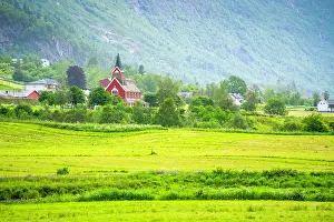 Pastoral Prints: View of Olden New Church in Olden village and mountains in Nordfjorden during summer