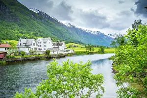 View of Olden village, mountains and Oldeelva river in Nordfjorden during summer, Norway, Scandinavia, Europe