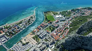 Homes Prints: View of Omis, Croatia from above showing the river