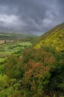 Land Prints: View from Orthodox Ikoti Monastery overlooking hills and valleys in South Ossetia during overcast weather