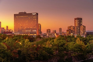 Chuo Prints: View of Osaka skyline from Osaka Castle at sunset, Chuo Ward, Osaka, Honshu, Japan