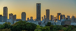 Chuo Prints: View of Osaka skyline from Osaka Castle at sunset, Chuo Ward, Osaka, Honshu, Japan
