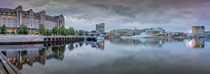 Public Space Prints: View of Oslo Opera House and Munch Museum reflecting in harbour on cloudy evening