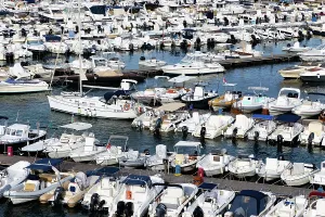 Docked Prints: View of Otranto with numerous boats docked in the harbor during the daytime in Puglia region Italy