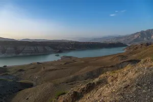 Uninhabited Prints: View from the overlook at Naghlu lake in eastern Afghanistan during daylight hours with mountains in the background