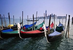 View past docked gondolas towards St