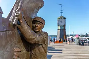 Cultural Landmark Prints: View of Pelle Gruppa statue and Aker Brygge Clock Tower in background