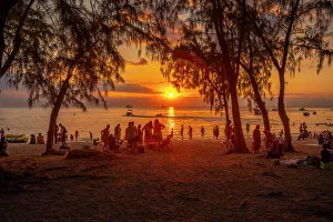 Boys Prints: View of people on Mon Choisy Public Beach at sunset, Mauritius, Indian Ocean, Africa