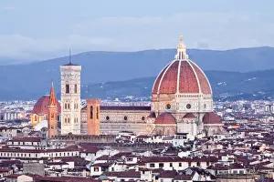 The view from Piazzale Michelangelo over to the historic city of Florence with the dome of Basilica di Santa Maria del Fiore (Duomo) lit up, Florence, UNESCO World Heritage Site, Tuscany, Italy, Europe