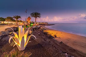 Las Palmas Prints: View of Playa Grande at dusk, Puerto Carmen