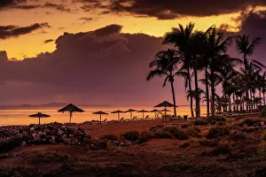 Las Palmas Prints: View of Playa de los Pocillos beach at sunset