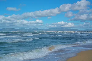 Foam Prints: View of Playa de Palma and Palma and hills in background from S'Arenal