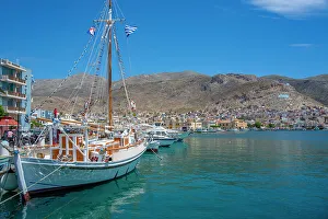 Kalimnos Prints: View of port and town of Kalimnos with hills in the background