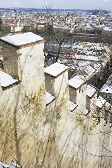 Mala Strana Prints: View of Prague from snow-covered Gothic Hunger Wall on Petrin Hill, Mala Strana