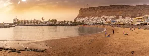 Gran Canaria Prints: View of Puerto de Mogan beach and town at golden hour