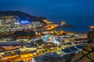 Gran Canaria Prints: View of Puerto Rico from elevated position at dusk