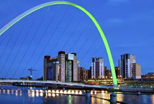 Flood Lit Prints: View along the Quayside at night showing the Baltic Centre for Contemporary Arts framed by the floodlit Gateshead