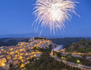 Celebration Gallery: View over Ragusa Ibla, dusk, fireworks marking the Festival of San Giorgio, Ragusa