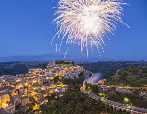 Fireworks Prints: View over Ragusa Ibla, dusk, fireworks marking the Festival of San Giorgio, Ragusa