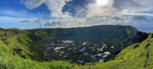 Volcano Prints: View of Rano Kau Volcano with pools and greenery under a bright sky at Easter Island during the day