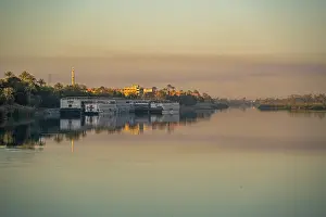 Silhouettes Prints: View of reflections in the Nile River at dawn at Al Daba Eya near Luxor