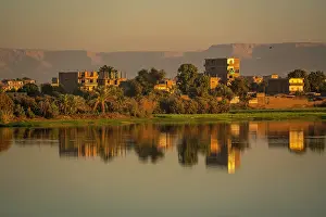 Luxor Prints: View of reflections in the Nile River at dawn at Al Daba Eya near Luxor